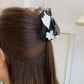 Black + White Cat Hair Claw
