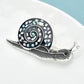 Snail Brooch with Inlaid Shell Detail