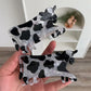Udderly Adorable Cow Hair Claw